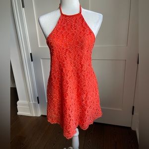 NBD orange lace halter neck dress.